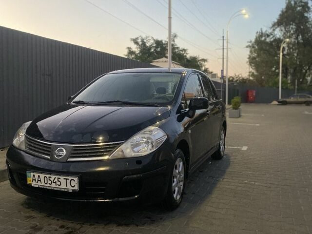 Черный Ниссан Тиида, объемом двигателя 1.6 л и пробегом 200 тыс. км за 4100 $, фото 1 на Automoto.ua