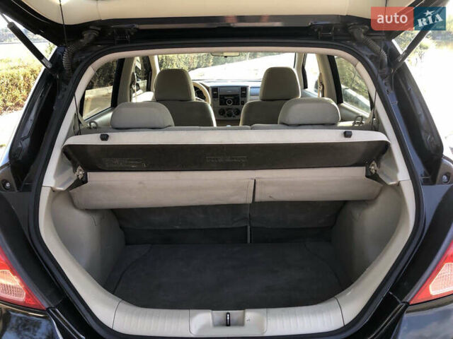 Черный Ниссан Тиида, объемом двигателя 1.6 л и пробегом 257 тыс. км за 5600 $, фото 20 на Automoto.ua