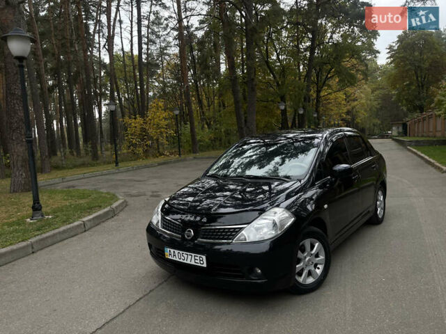 Черный Ниссан Тиида, объемом двигателя 1.6 л и пробегом 188 тыс. км за 5850 $, фото 2 на Automoto.ua