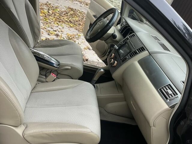 Черный Ниссан Тиида, объемом двигателя 1.6 л и пробегом 304 тыс. км за 4700 $, фото 9 на Automoto.ua