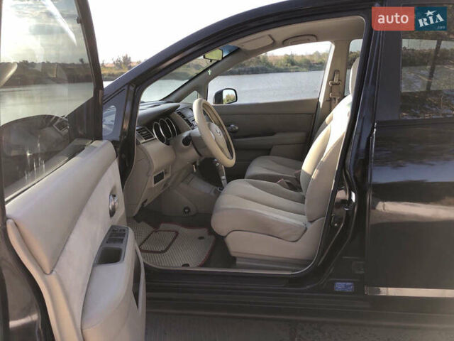 Черный Ниссан Тиида, объемом двигателя 1.6 л и пробегом 257 тыс. км за 5600 $, фото 13 на Automoto.ua