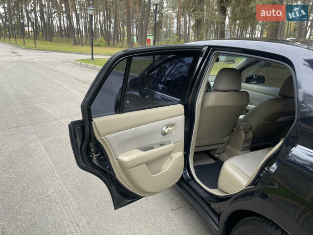 Черный Ниссан Тиида, объемом двигателя 1.6 л и пробегом 188 тыс. км за 5850 $, фото 17 на Automoto.ua