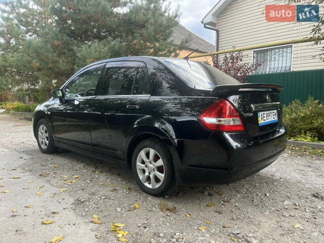 Черный Ниссан Тиида, объемом двигателя 1.6 л и пробегом 304 тыс. км за 4600 $, фото 7 на Automoto.ua