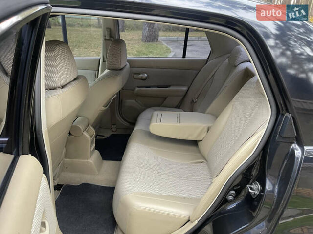 Черный Ниссан Тиида, объемом двигателя 1.6 л и пробегом 188 тыс. км за 5850 $, фото 19 на Automoto.ua