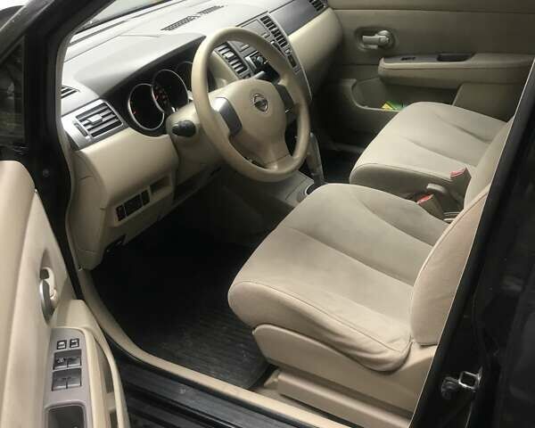 Черный Ниссан Тиида, объемом двигателя 1.6 л и пробегом 210 тыс. км за 3900 $, фото 4 на Automoto.ua