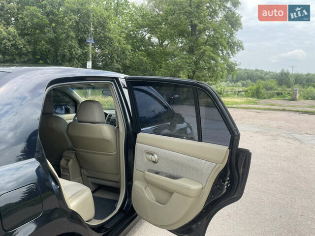 Черный Ниссан Тиида, объемом двигателя 1.6 л и пробегом 187 тыс. км за 5800 $, фото 23 на Automoto.ua