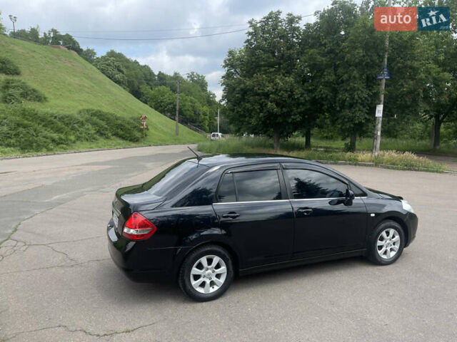 Черный Ниссан Тиида, объемом двигателя 1.6 л и пробегом 187 тыс. км за 5800 $, фото 8 на Automoto.ua