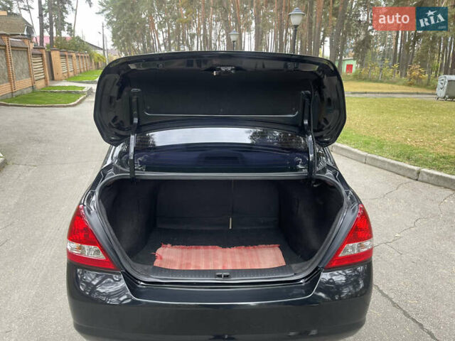 Черный Ниссан Тиида, объемом двигателя 1.6 л и пробегом 188 тыс. км за 5850 $, фото 20 на Automoto.ua