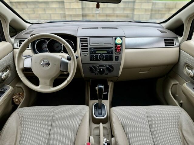 Чорний Ніссан Тііда, об'ємом двигуна 1.6 л та пробігом 130 тис. км за 4850 $, фото 6 на Automoto.ua