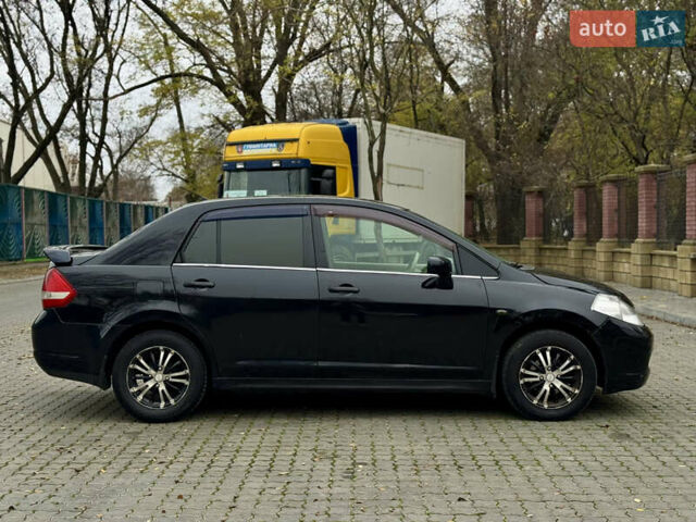Черный Ниссан Тиида, объемом двигателя 1.6 л и пробегом 132 тыс. км за 4850 $, фото 7 на Automoto.ua