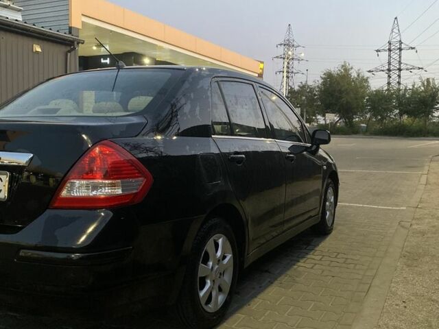 Черный Ниссан Тиида, объемом двигателя 1.6 л и пробегом 200 тыс. км за 4100 $, фото 4 на Automoto.ua