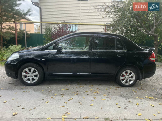 Черный Ниссан Тиида, объемом двигателя 1.6 л и пробегом 304 тыс. км за 4600 $, фото 6 на Automoto.ua