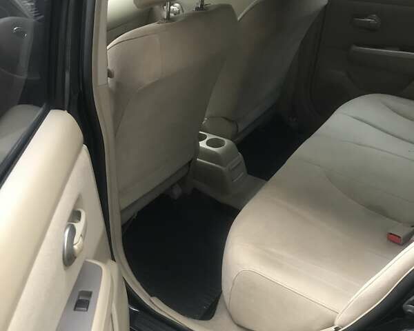 Черный Ниссан Тиида, объемом двигателя 1.6 л и пробегом 210 тыс. км за 3900 $, фото 6 на Automoto.ua