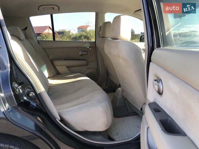 Черный Ниссан Тиида, объемом двигателя 1.6 л и пробегом 257 тыс. км за 5600 $, фото 16 на Automoto.ua