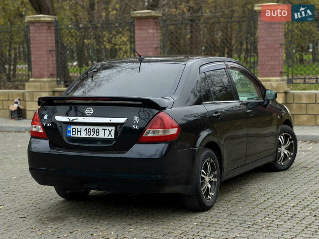 Черный Ниссан Тиида, объемом двигателя 1.6 л и пробегом 132 тыс. км за 4850 $, фото 2 на Automoto.ua