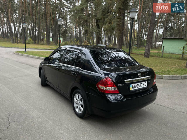 Черный Ниссан Тиида, объемом двигателя 1.6 л и пробегом 188 тыс. км за 5850 $, фото 6 на Automoto.ua