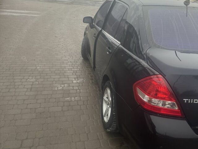 Чорний Ніссан Тііда, об'ємом двигуна 1.6 л та пробігом 150 тис. км за 5600 $, фото 4 на Automoto.ua