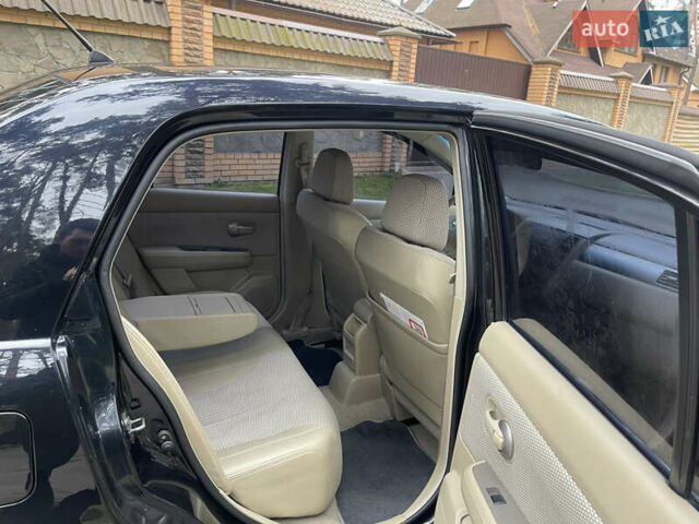 Черный Ниссан Тиида, объемом двигателя 1.6 л и пробегом 188 тыс. км за 5850 $, фото 23 на Automoto.ua