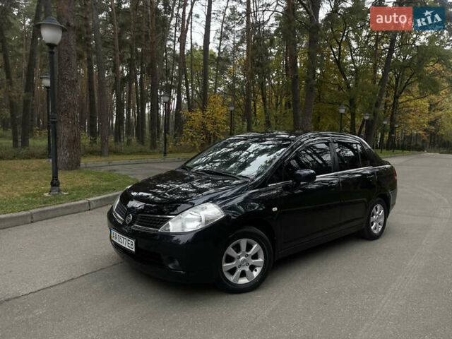 Черный Ниссан Тиида, объемом двигателя 1.6 л и пробегом 188 тыс. км за 5850 $, фото 3 на Automoto.ua