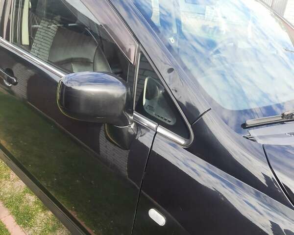 Черный Ниссан Тиида, объемом двигателя 1.8 л и пробегом 270 тыс. км за 2900 $, фото 29 на Automoto.ua