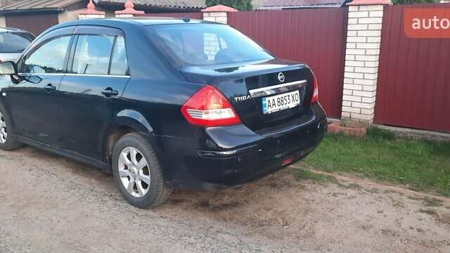 Черный Ниссан Тиида, объемом двигателя 1.8 л и пробегом 270 тыс. км за 2900 $, фото 6 на Automoto.ua