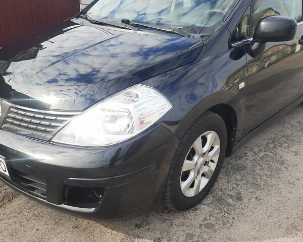Черный Ниссан Тиида, объемом двигателя 1.8 л и пробегом 270 тыс. км за 2900 $, фото 24 на Automoto.ua