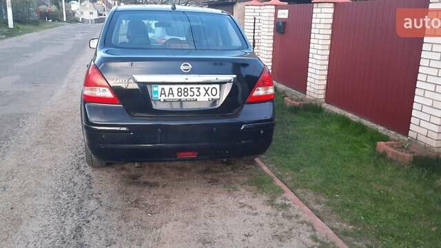 Черный Ниссан Тиида, объемом двигателя 1.8 л и пробегом 270 тыс. км за 2900 $, фото 4 на Automoto.ua