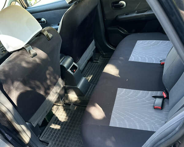 Чорний Ніссан Тііда, об'ємом двигуна 1.6 л та пробігом 121 тис. км за 4950 $, фото 3 на Automoto.ua