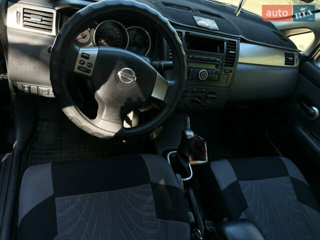 Чорний Ніссан Тііда, об'ємом двигуна 1.6 л та пробігом 121 тис. км за 4950 $, фото 6 на Automoto.ua