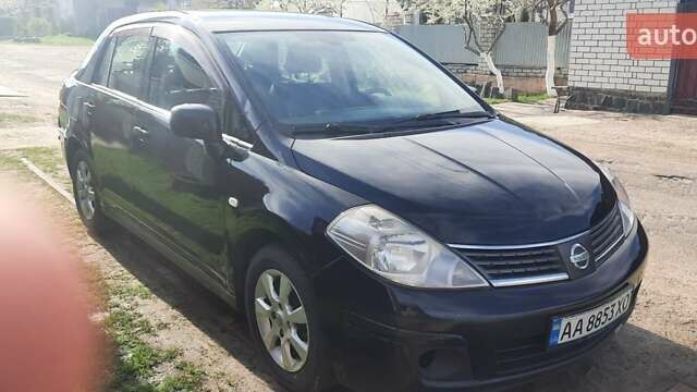 Черный Ниссан Тиида, объемом двигателя 1.8 л и пробегом 270 тыс. км за 2900 $, фото 17 на Automoto.ua