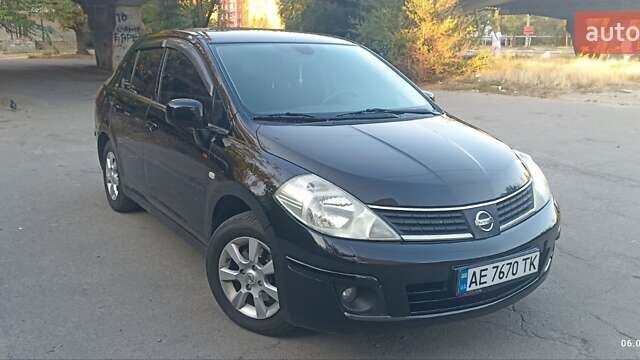 Чорний Ніссан Тііда, об'ємом двигуна 1.6 л та пробігом 244 тис. км за 4500 $, фото 5 на Automoto.ua