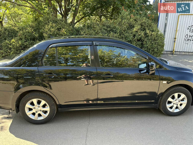 Чорний Ніссан Тііда, об'ємом двигуна 1.6 л та пробігом 121 тис. км за 4950 $, фото 1 на Automoto.ua