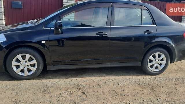 Черный Ниссан Тиида, объемом двигателя 1.8 л и пробегом 270 тыс. км за 2900 $, фото 19 на Automoto.ua