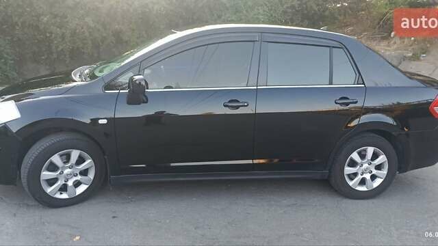 Чорний Ніссан Тііда, об'ємом двигуна 1.6 л та пробігом 244 тис. км за 4500 $, фото 1 на Automoto.ua