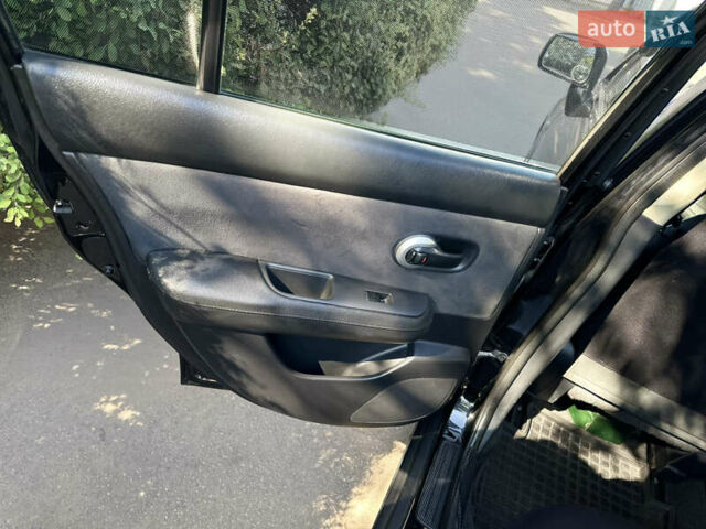 Чорний Ніссан Тііда, об'ємом двигуна 1.6 л та пробігом 121 тис. км за 4950 $, фото 4 на Automoto.ua