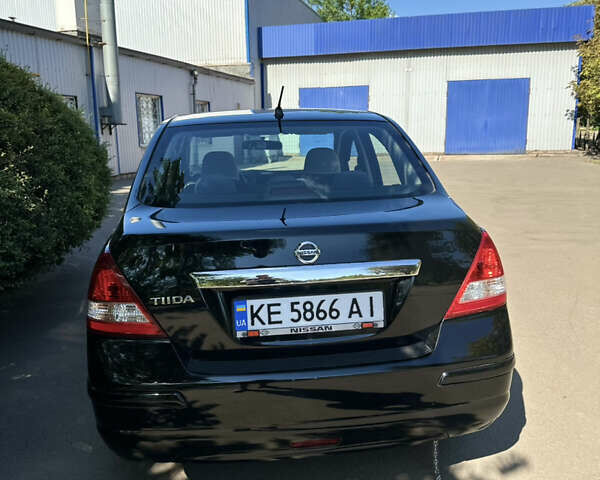 Чорний Ніссан Тііда, об'ємом двигуна 1.6 л та пробігом 121 тис. км за 4950 $, фото 7 на Automoto.ua