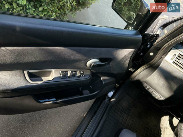 Чорний Ніссан Тііда, об'ємом двигуна 1.6 л та пробігом 121 тис. км за 4950 $, фото 9 на Automoto.ua