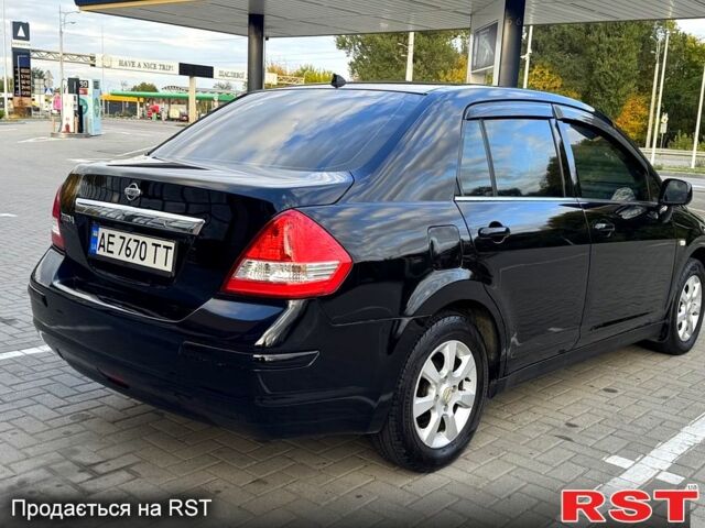 Черный Ниссан Тиида, объемом двигателя 1.6 л и пробегом 137 тыс. км за 5700 $, фото 5 на Automoto.ua