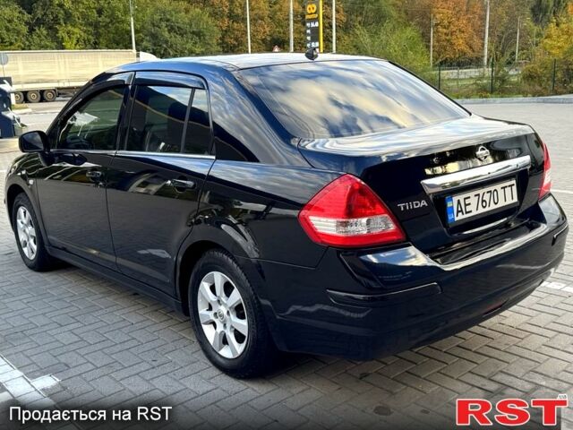 Черный Ниссан Тиида, объемом двигателя 1.6 л и пробегом 137 тыс. км за 5700 $, фото 3 на Automoto.ua