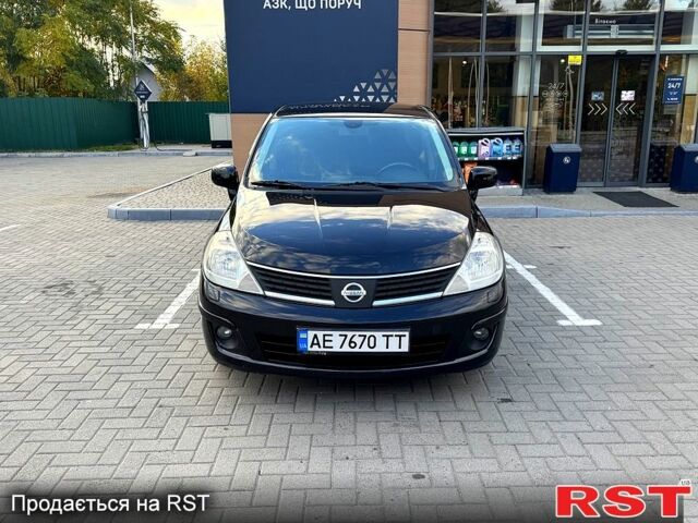 Черный Ниссан Тиида, объемом двигателя 1.6 л и пробегом 137 тыс. км за 5700 $, фото 1 на Automoto.ua