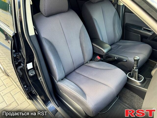 Черный Ниссан Тиида, объемом двигателя 1.6 л и пробегом 137 тыс. км за 5700 $, фото 7 на Automoto.ua