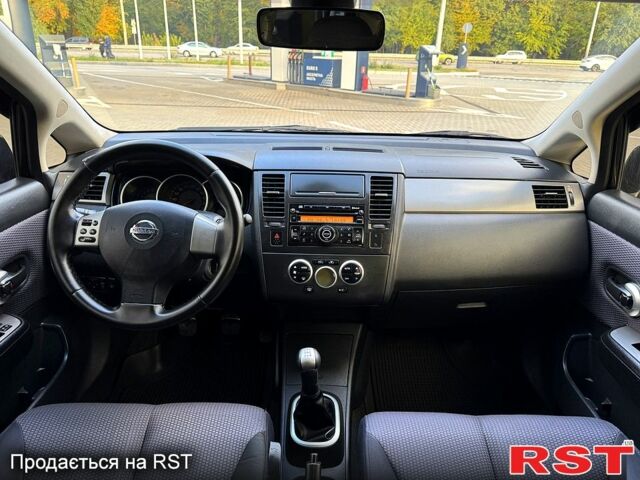 Черный Ниссан Тиида, объемом двигателя 1.6 л и пробегом 137 тыс. км за 5700 $, фото 6 на Automoto.ua