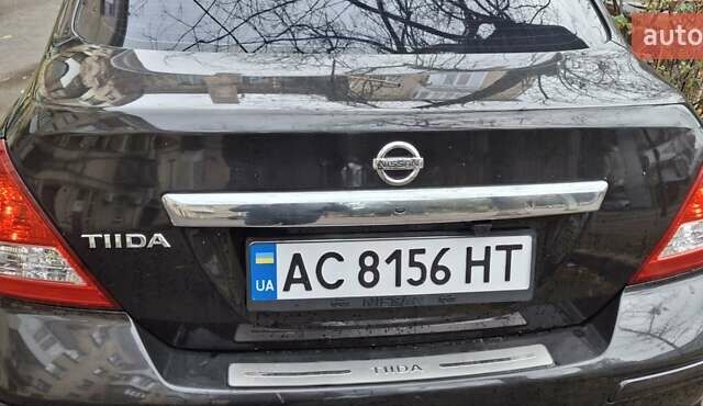 Чорний Ніссан Тііда, об'ємом двигуна 1.8 л та пробігом 112 тис. км за 6500 $, фото 1 на Automoto.ua