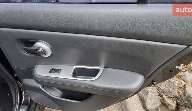 Чорний Ніссан Тііда, об'ємом двигуна 1.8 л та пробігом 112 тис. км за 6500 $, фото 4 на Automoto.ua