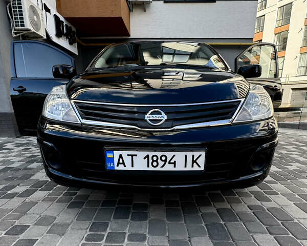 Черный Ниссан Тиида, объемом двигателя 1.6 л и пробегом 192 тыс. км за 5499 $, фото 20 на Automoto.ua