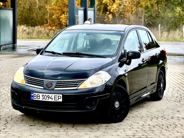 Черный Ниссан Тиида, объемом двигателя 1.6 л и пробегом 170 тыс. км за 4199 $, фото 5 на Automoto.ua