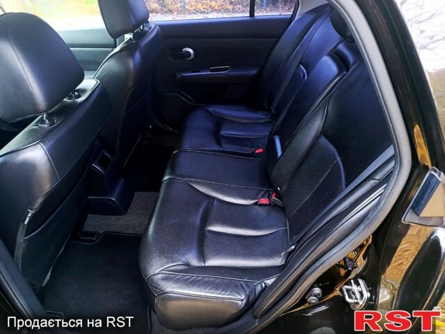 Черный Ниссан Тиида, объемом двигателя 1.8 л и пробегом 110 тыс. км за 5600 $, фото 6 на Automoto.ua