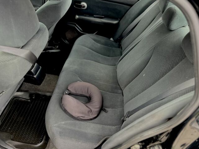 Черный Ниссан Тиида, объемом двигателя 1.6 л и пробегом 170 тыс. км за 4199 $, фото 7 на Automoto.ua