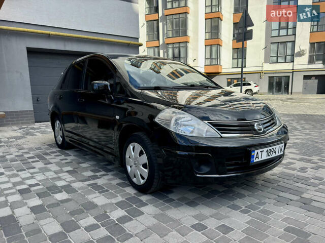 Черный Ниссан Тиида, объемом двигателя 1.6 л и пробегом 192 тыс. км за 5499 $, фото 5 на Automoto.ua