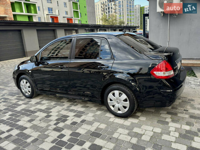 Черный Ниссан Тиида, объемом двигателя 1.6 л и пробегом 192 тыс. км за 5499 $, фото 3 на Automoto.ua